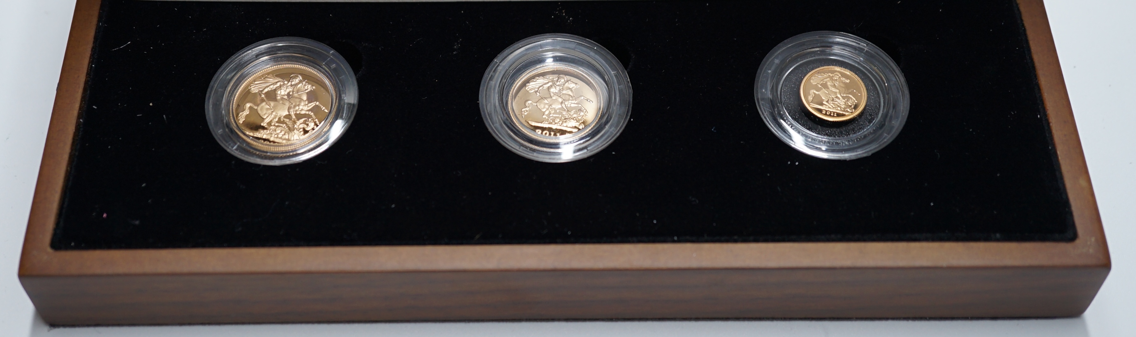British gold coins, Elizabeth II, 2011 gold proof Sovereign three coin collection; sovereign, half sovereign and quarter sovereign, St. George and the dragon, in case of issue with certificate